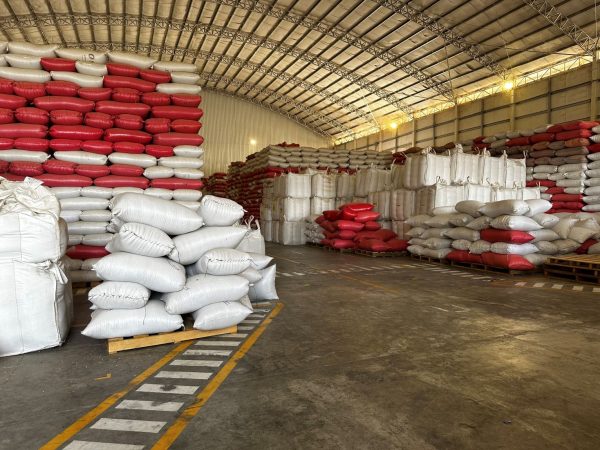large bags of coffee beans in a warehouse